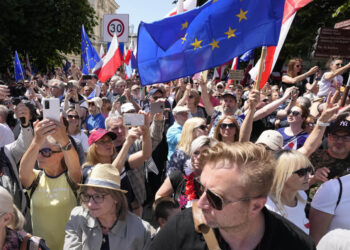 Hundreds of thousands march in Poland anti-government protests to show support for democracy