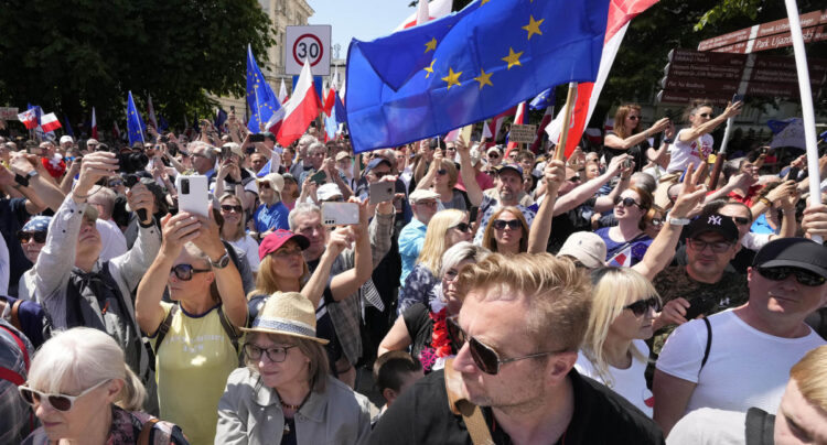Hundreds of thousands march in Poland anti-government protests to show support for democracy