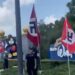 Protesters carrying Nazi flags and DeSantis imagery gathered outside Disney World in Orlando, Florida