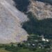 Images show how a Swiss Alps village narrowly escaped being wiped out by a massive rockslide that missed ‘by a hair’