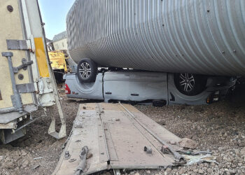 23 freight cars, new vehicles heavily damaged in train derailment in northern Arizona