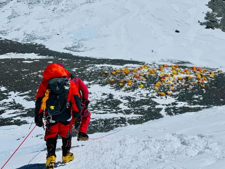 A Chinese climber saved from Mount Everest has been caught in a social media firestorm after being accused of refusing to pay a promised $10,000 fee to the Sherpas who rescued her