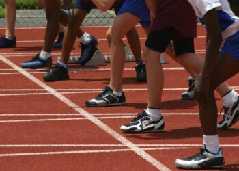 A 9-year-old girl at a school track and field event was left ‘shaking and sobbing’ after a man accused her of being trans and demanded her disqualification, mom says