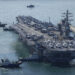 A US aircraft carrier will make a rare Vietnam port call as countries compete for favor in SE Asia