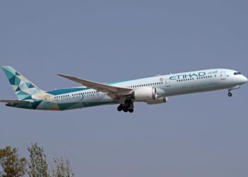 An airline worker texted a passenger as she waited to board her flight after looking up her number in the company system, then told her to ‘block me’ if she didn’t like it