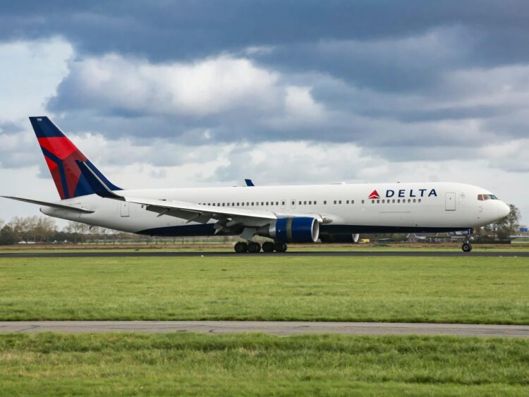 A Delta flight to New York was canceled shortly before takeoff after a crew member was arrested