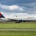 A Delta flight to New York was canceled shortly before takeoff after a crew member was arrested