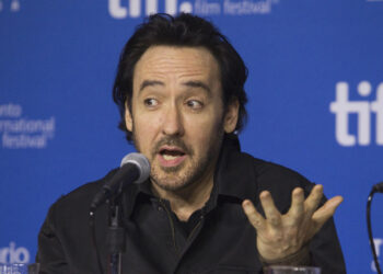 John Cusack says no one cares when refugees capsize