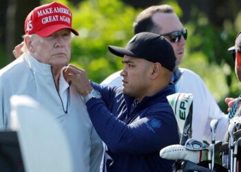 The valet who brought Donald Trump his Diet Coke is also charged