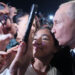 Putin greets stunned crowd on walkabout in Derbent, forgetting Covid fears