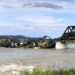 A bridge over Yellowstone River collapses, sending a freight train into the waters below