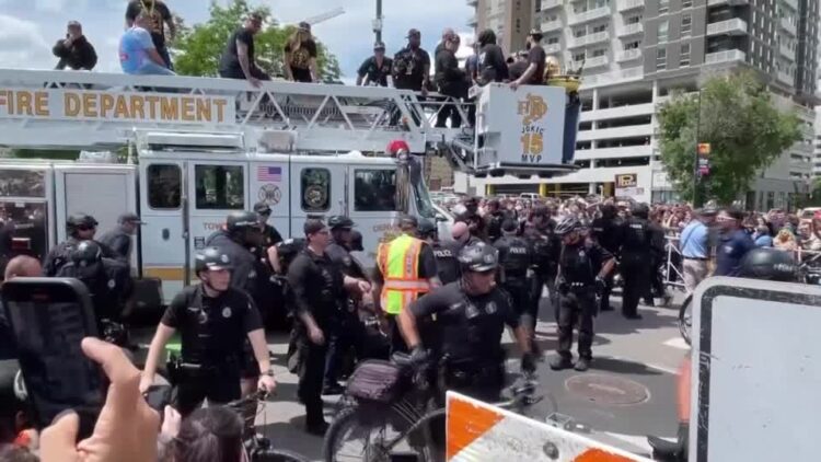 Police officer ran over by Denver Nuggets parade truck