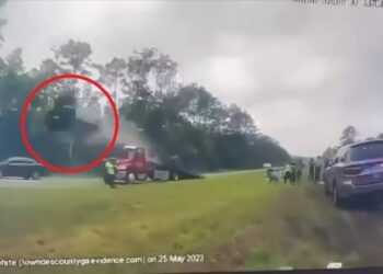 Car slams into tow truck ramp and flips 120 feet in air on Georgia highway, video shows