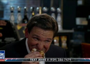 Ron DeSantis Says The Left Doesn’t ‘Want People to Be Happy,’ Then Awkwardly Eats Pizza (Video)