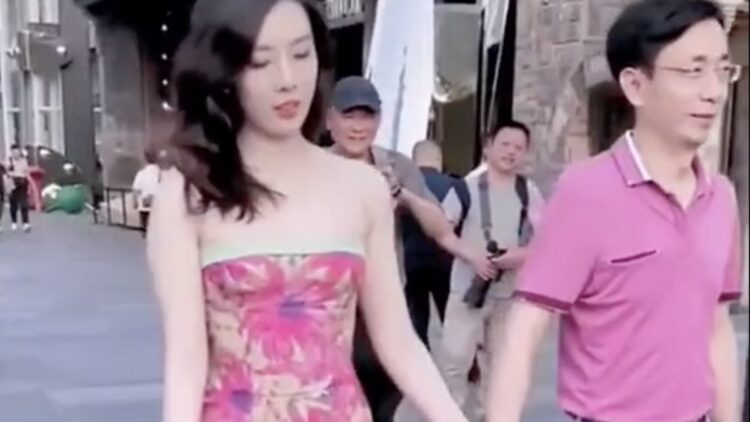 Executive Fired After Street Photographer Captures Him Holding Hands With Mistress